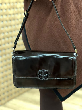 BOLSA TIRACOLO ENVERNIZADA