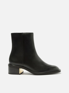BOTA COURO CANO MÉDIO BLOCO METAL