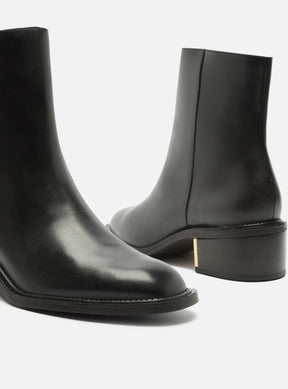 BOTA COURO CANO MÉDIO BLOCO METAL
